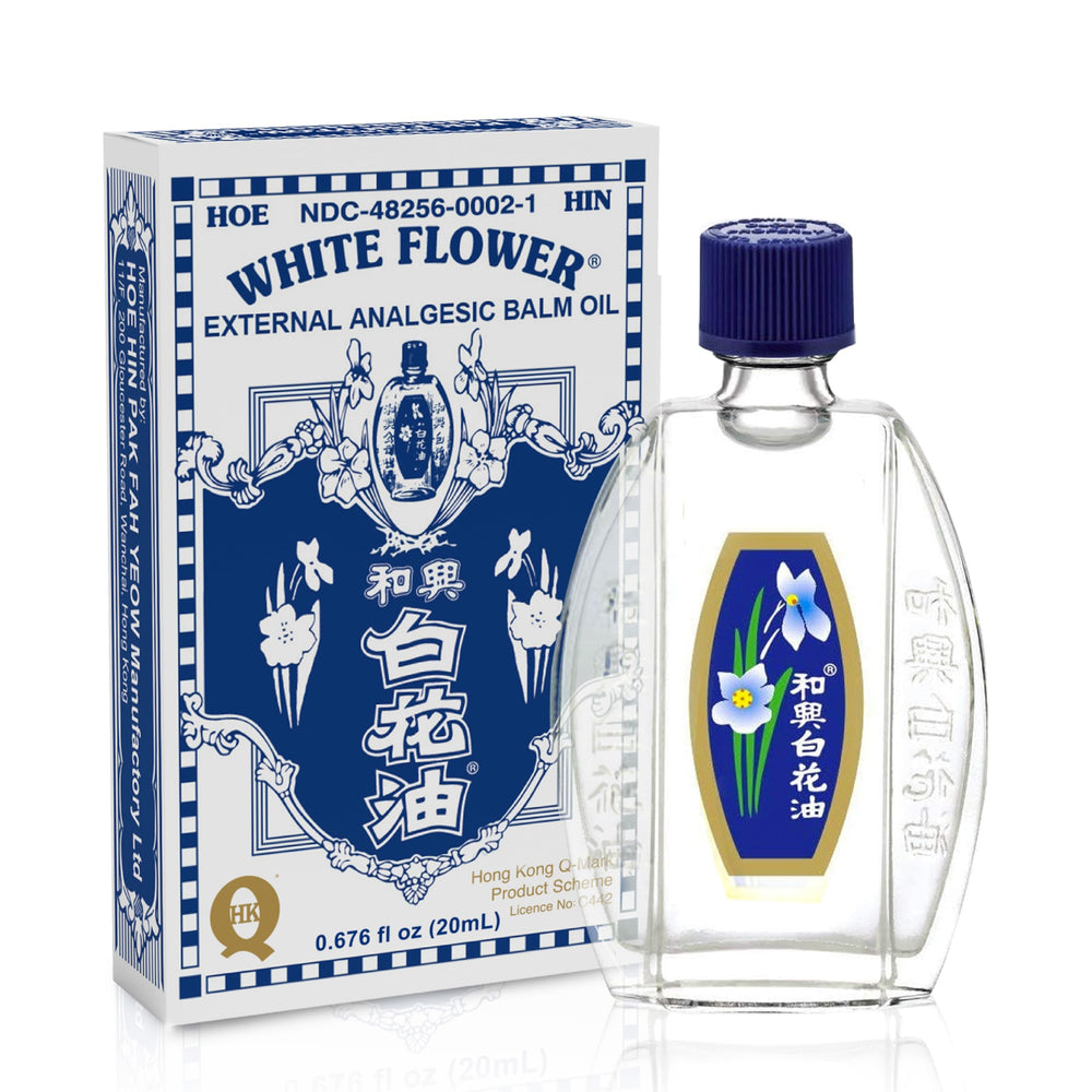 White Flower External Analgesic Balm Oil bottle front view for portable use