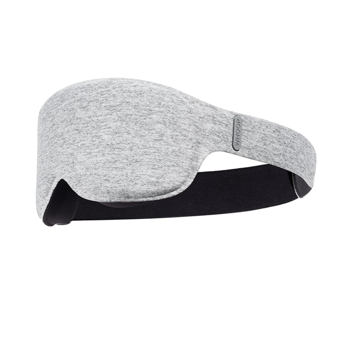 Whoop Restorative Sleep Mask on pillow shows premium light-blocking comfort.