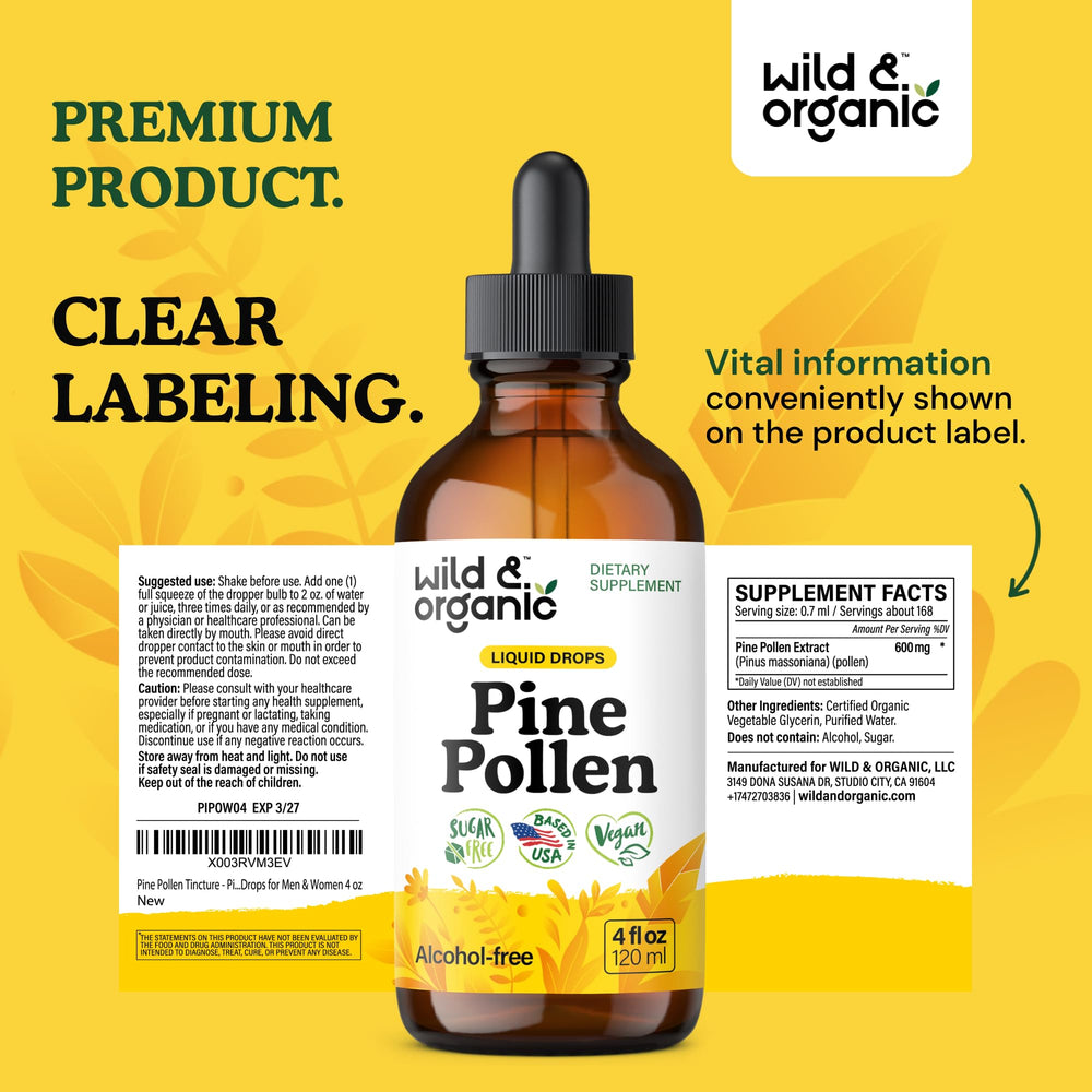 Glass bottle of Wild & Organic tincture on shelf with natural backdrop