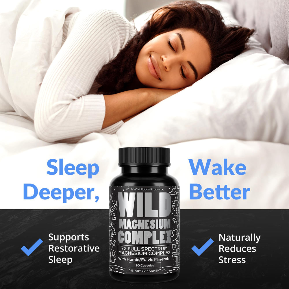 Wild Foods Magnesium Complex capsules in hand — portable, ready-to-take magnesium support.