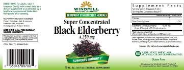 Windmill Black Elderberry liquid teaspoon pour showing convenient servings