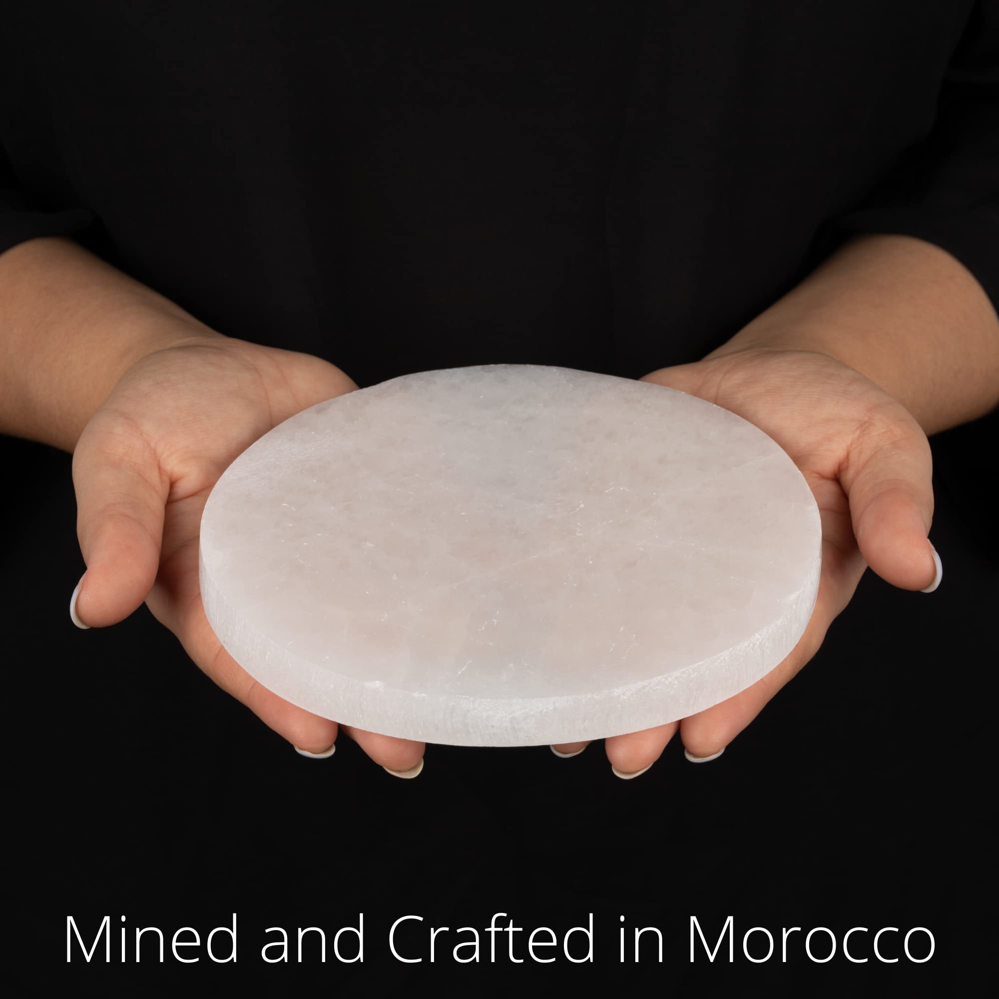 Wish Well selenite plate for meditation altar aids calm focus during practices.