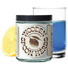 Wooden Spoon Herbs Magic Magnesium powder tub front promotes relaxation with lemon flavor.