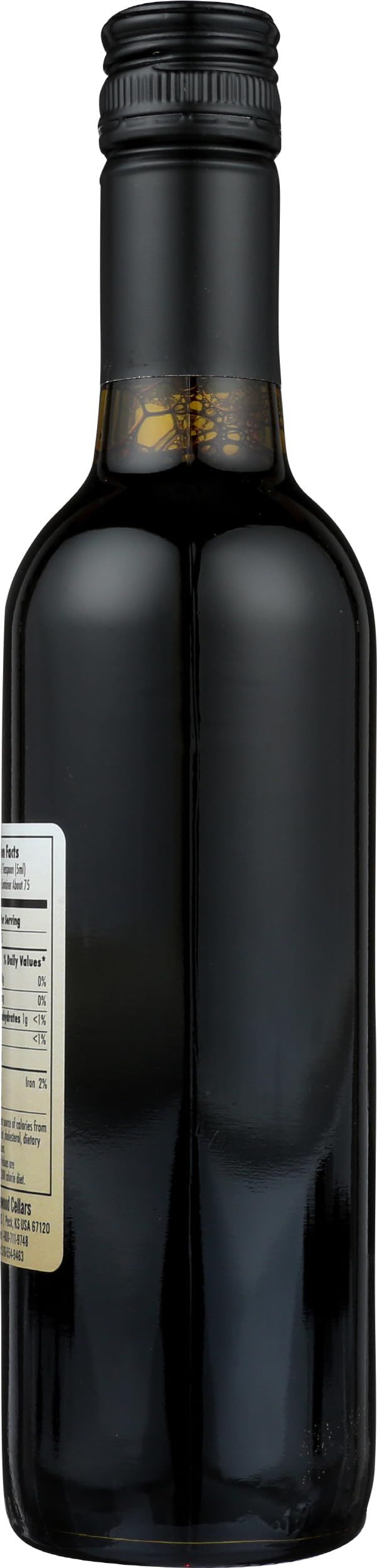 Pouring Wyldewood Cellars Elderberry Concentrate highlights natural flavor.