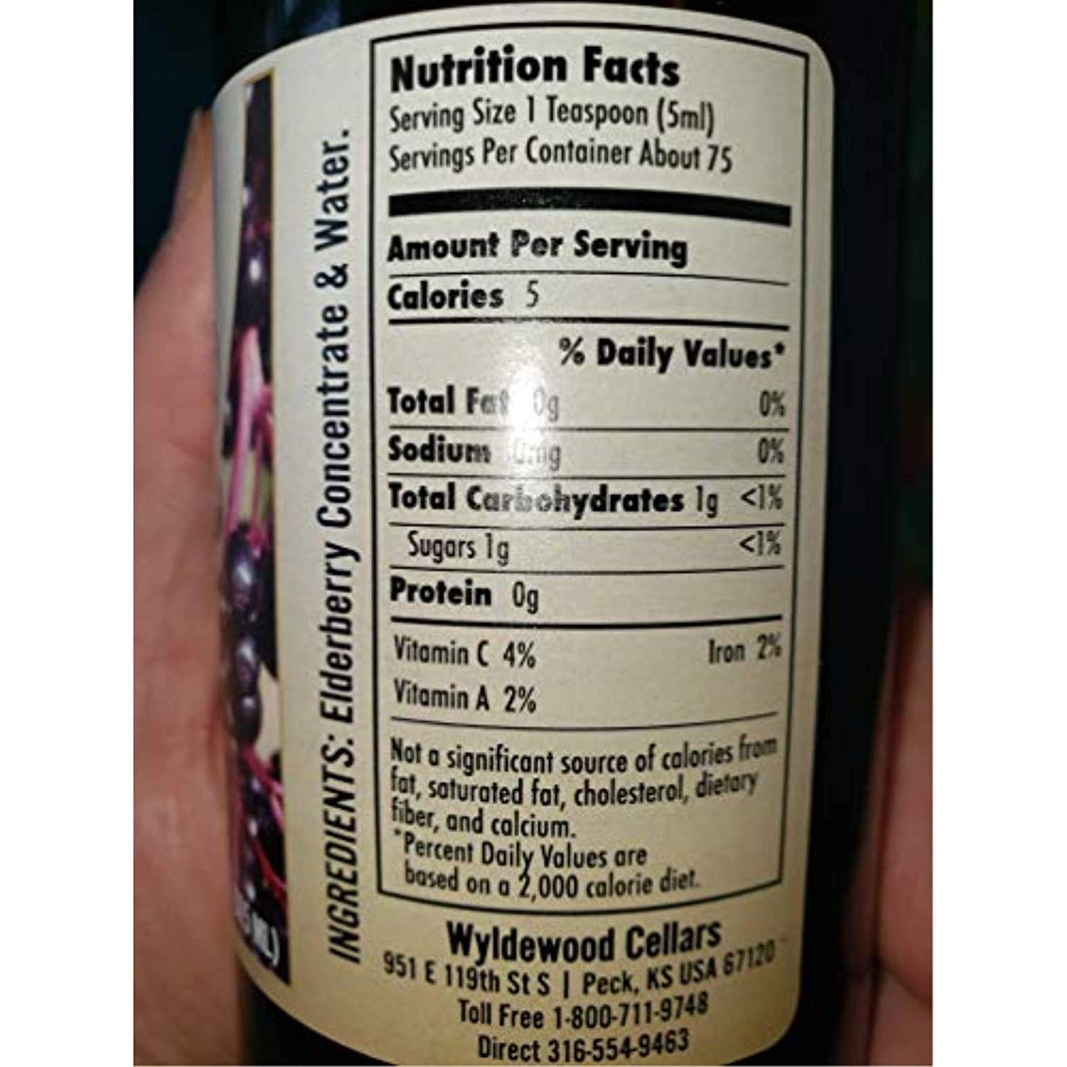 Wyldewood Elderberry bottle cap close-up suggests convenient, additive-free nutrition.