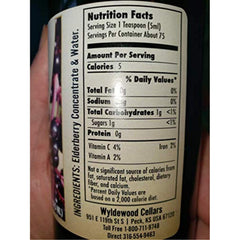 Wyldewood Elderberry bottle cap close-up suggests convenient, additive-free nutrition.