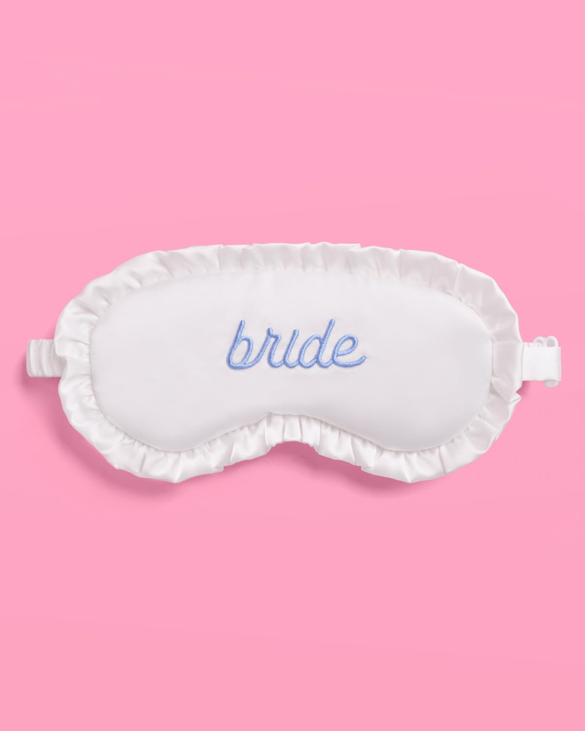 xo, Fetti model wearing sleep mask during bridal prep at home.