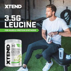 Xtend Original BCAA powder poured into a shaker during workouts