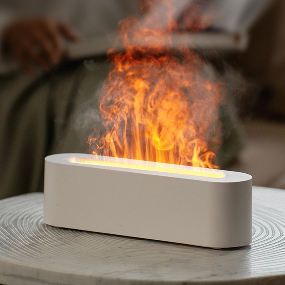 Yaledi Essential Oil Diffuser with fireplace flame visual promotes relaxation at home.