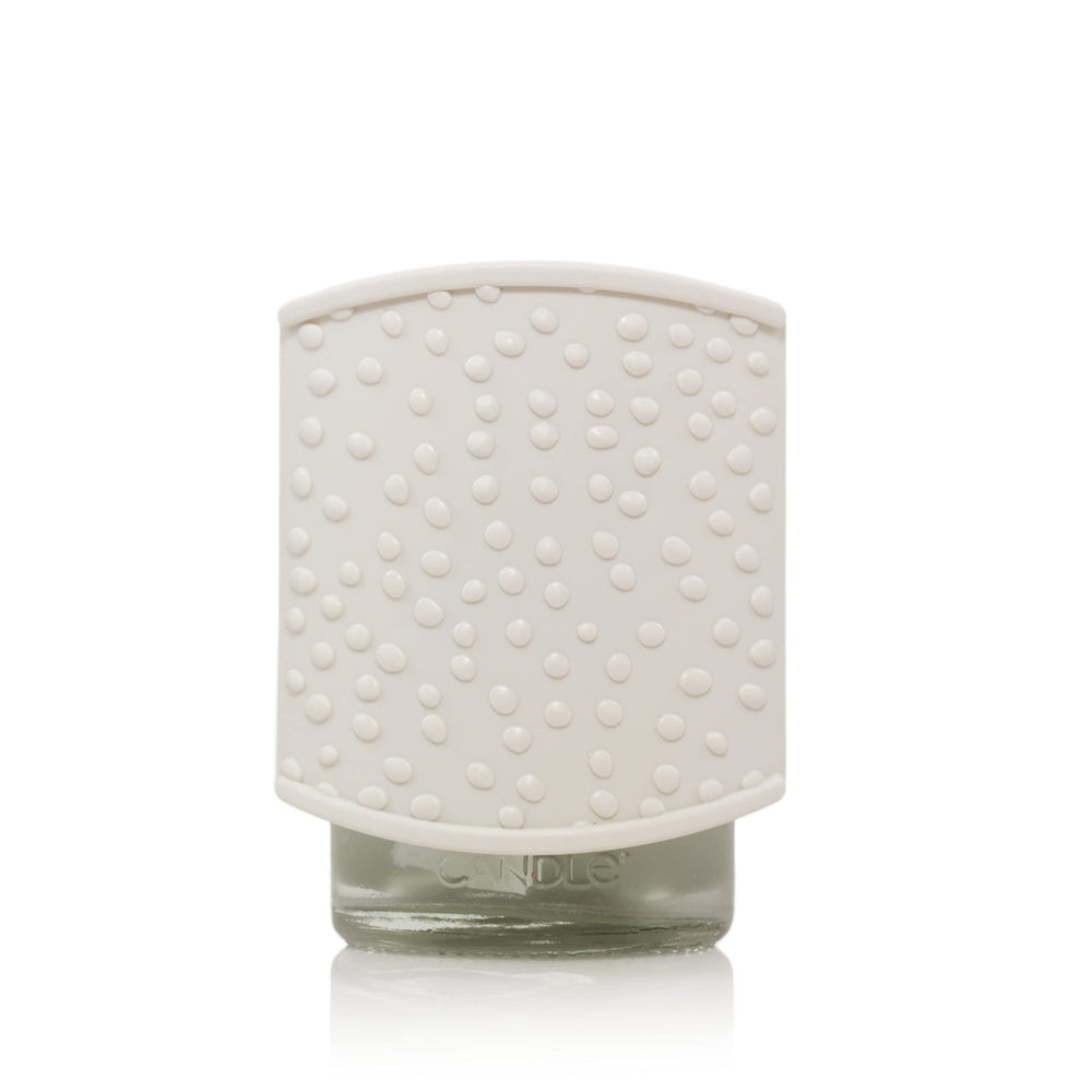 Yankee Candle Sprinkle Dots ScentPlug diffuser base elevates ambiance with warm fragrance.
