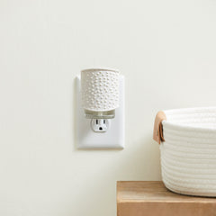 Yankee Candle Sprinkle Dots ScentPlug with control panel lets you choose intensity.