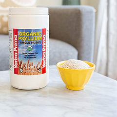 Measuring scoop with psyllium husk ready for daily fiber use.