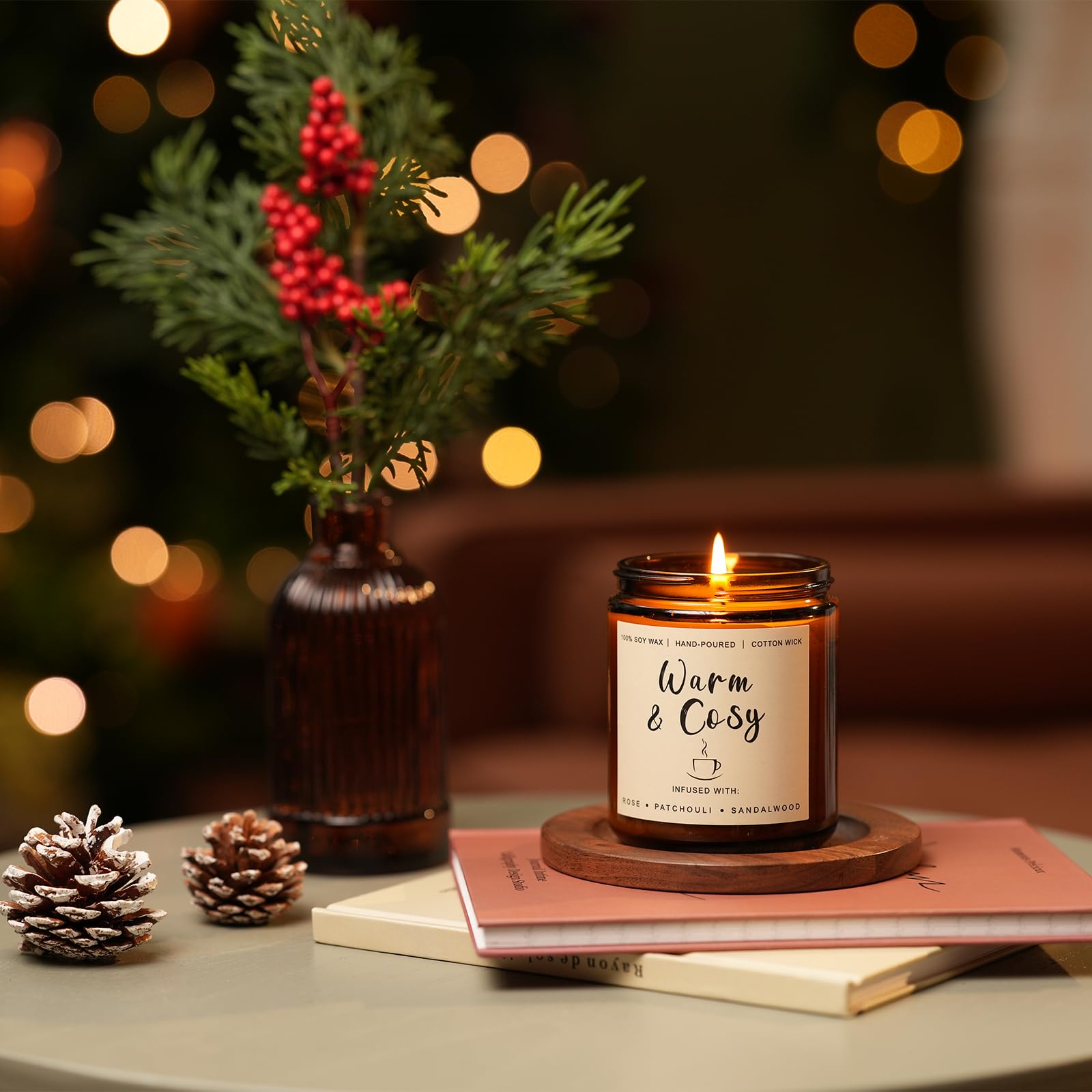 Yinuo Candle Snowy packaging close-up evokes festive decor aesthetics.