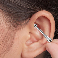 Ymapinc acupuncture pen targeting trigger points on feet and calves.