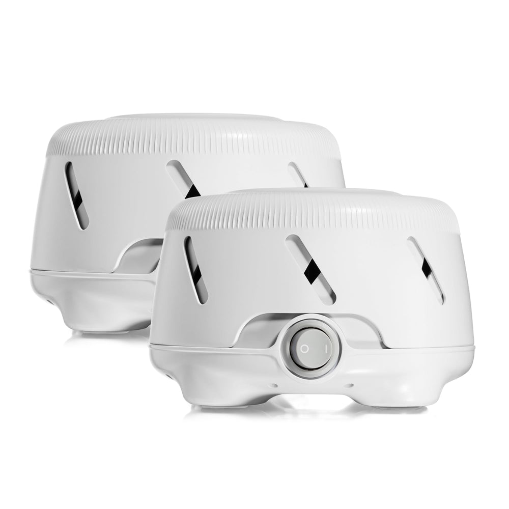 Yogasleep Dohm Uno two-pack on a nightstand delivering natural white noise for sleep