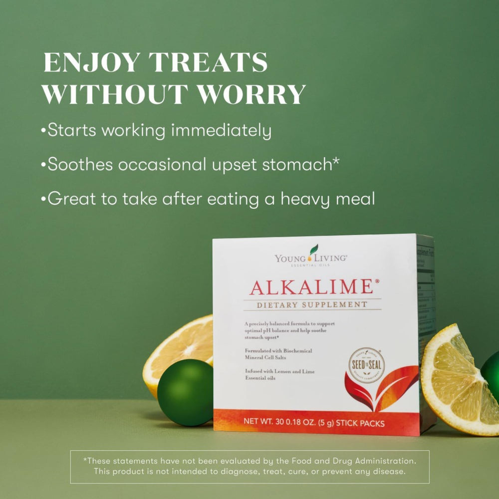 Young Living AlkaLime Stick Packs dissolving in water for a refreshing citrus drink