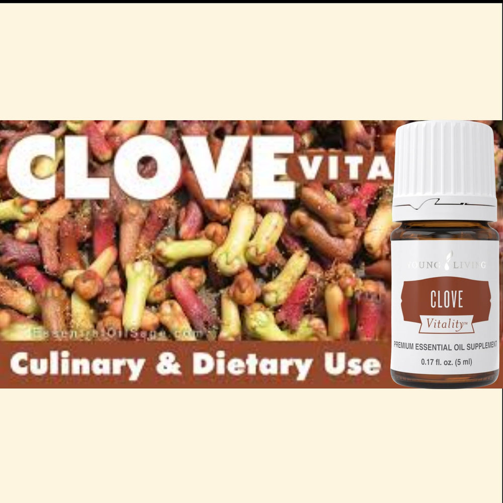 Clove Vitality bottle in tea mug for cozy, spicy infusion.