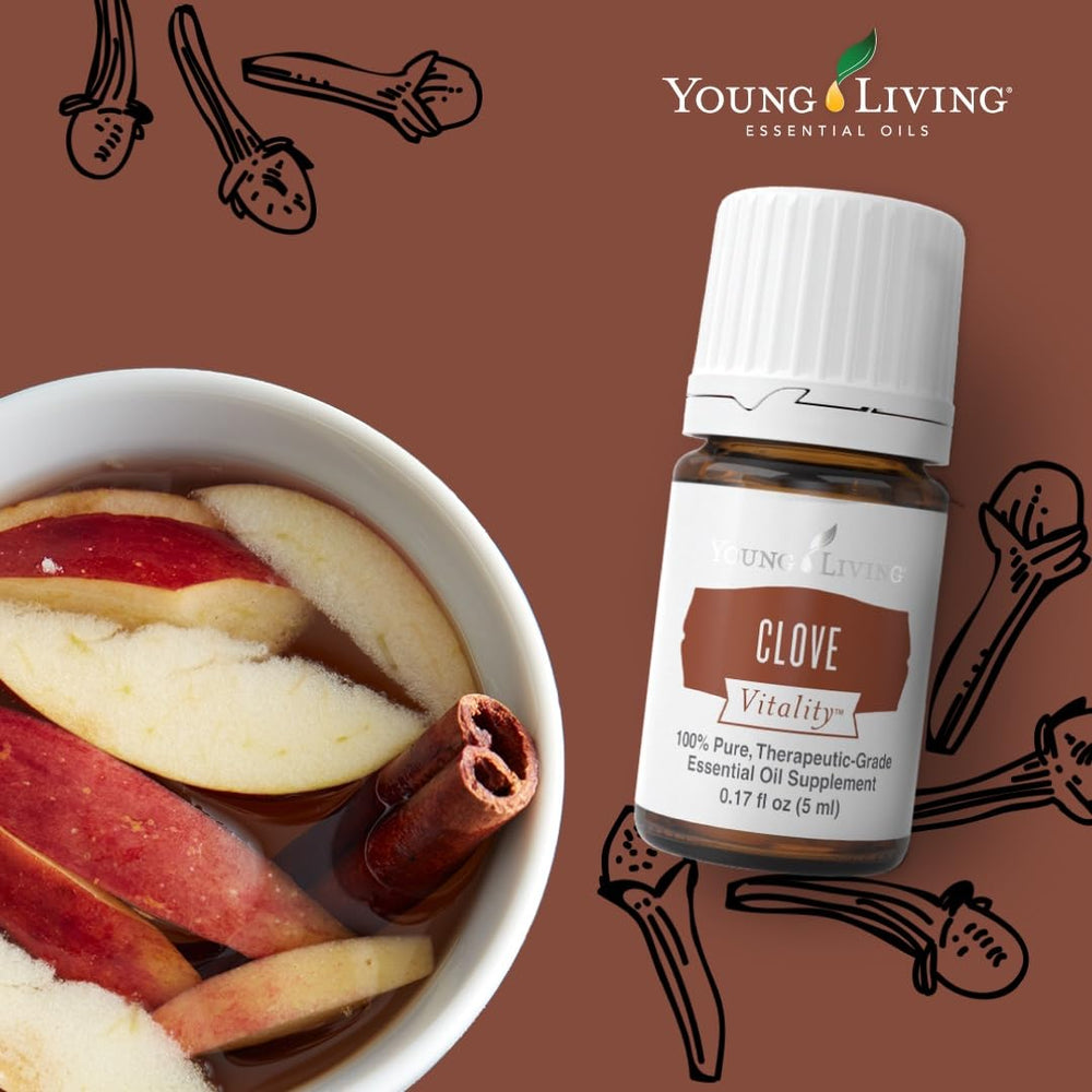 Young Living Clove Vitality beside spices for baking flavorful treats.