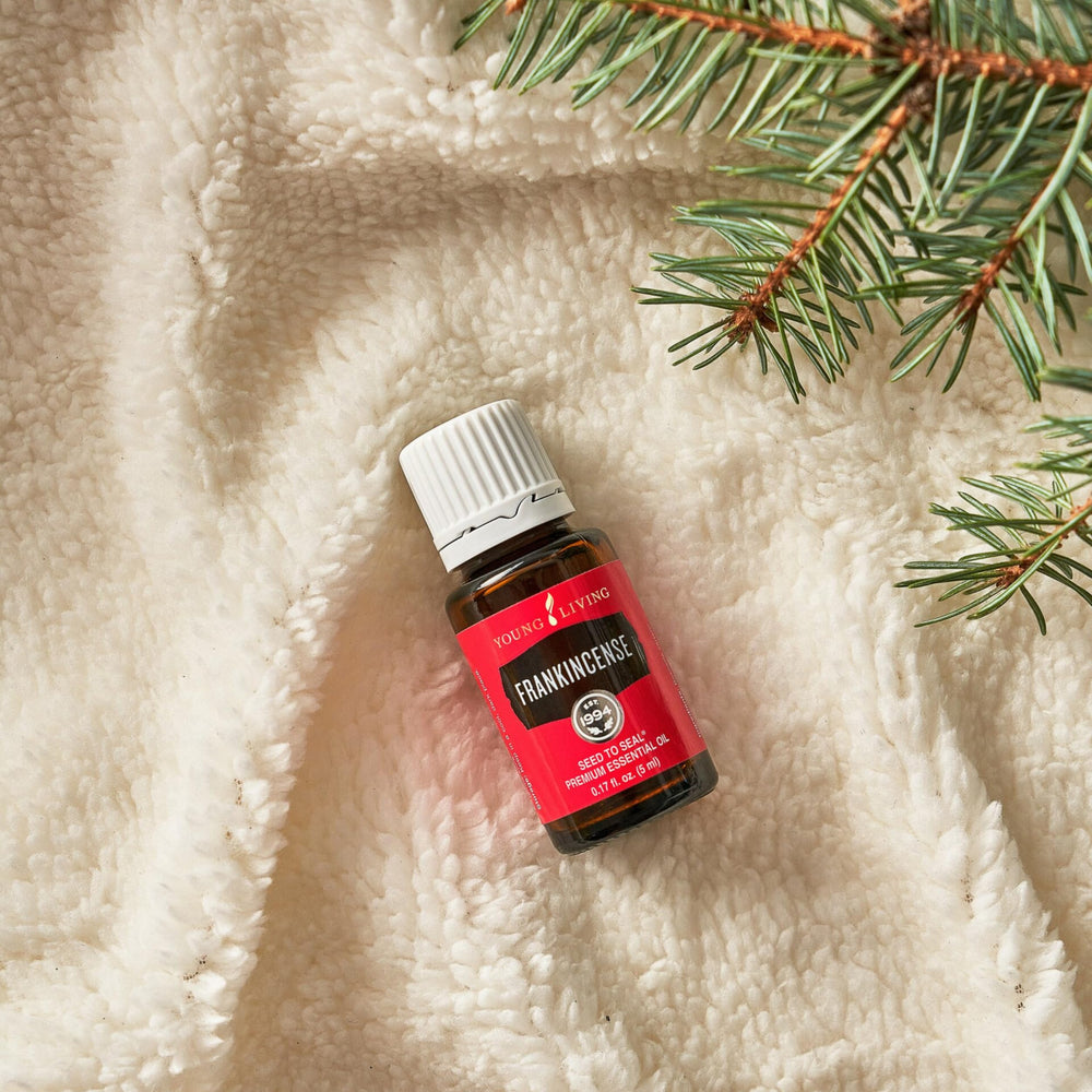 Frankincense essential oil in diffuser for a calming aroma.