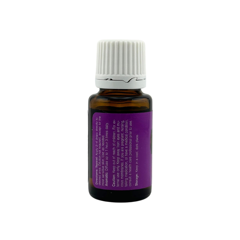 Young Living Lavender Oil bottle with shampoo—classic scent enhances daily hair care.