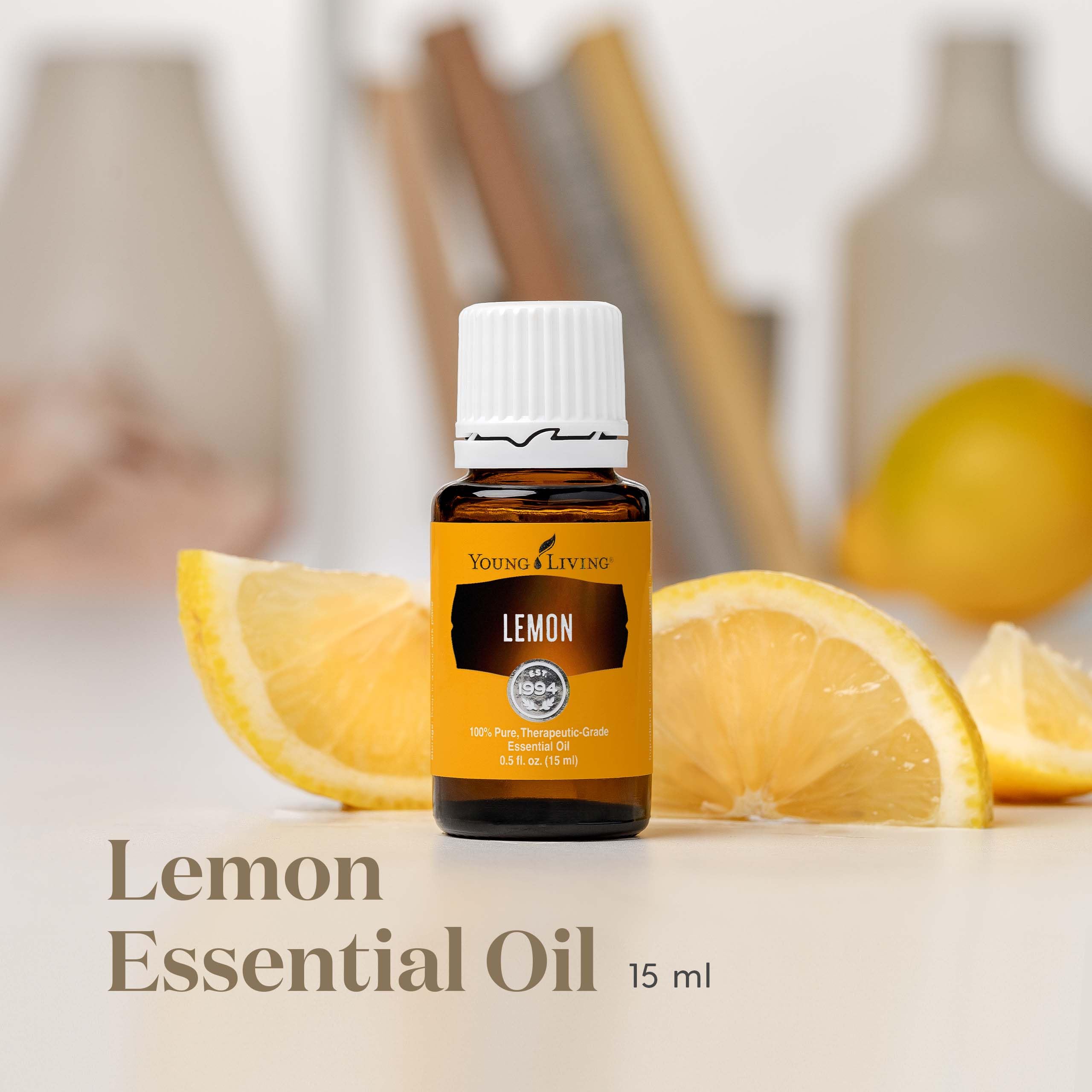 Young Living Lemon bottle in diffuser setup releasing bright citrus fragrance