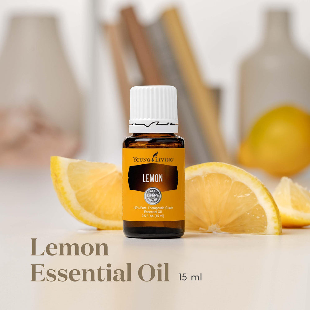 Young Living Lemon bottle in diffuser setup releasing bright citrus fragrance
