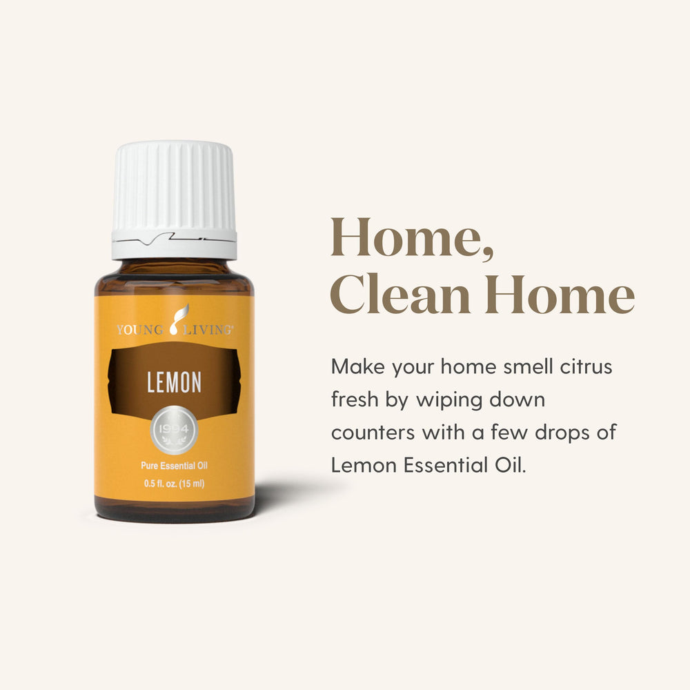 Young Living Lemon bottle beside a running diffuser releasing fragrance