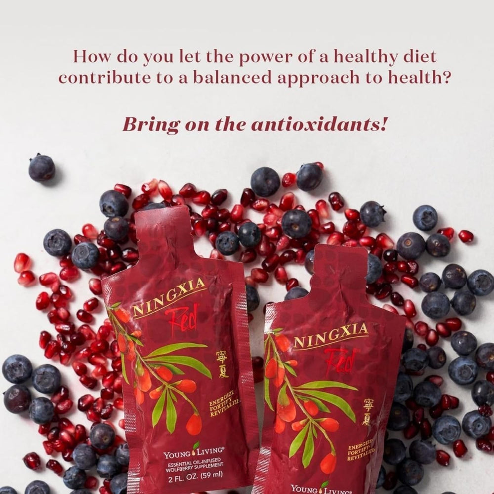 Two-ounce Ningxia Red packet beside workout essentials for a quick uplift