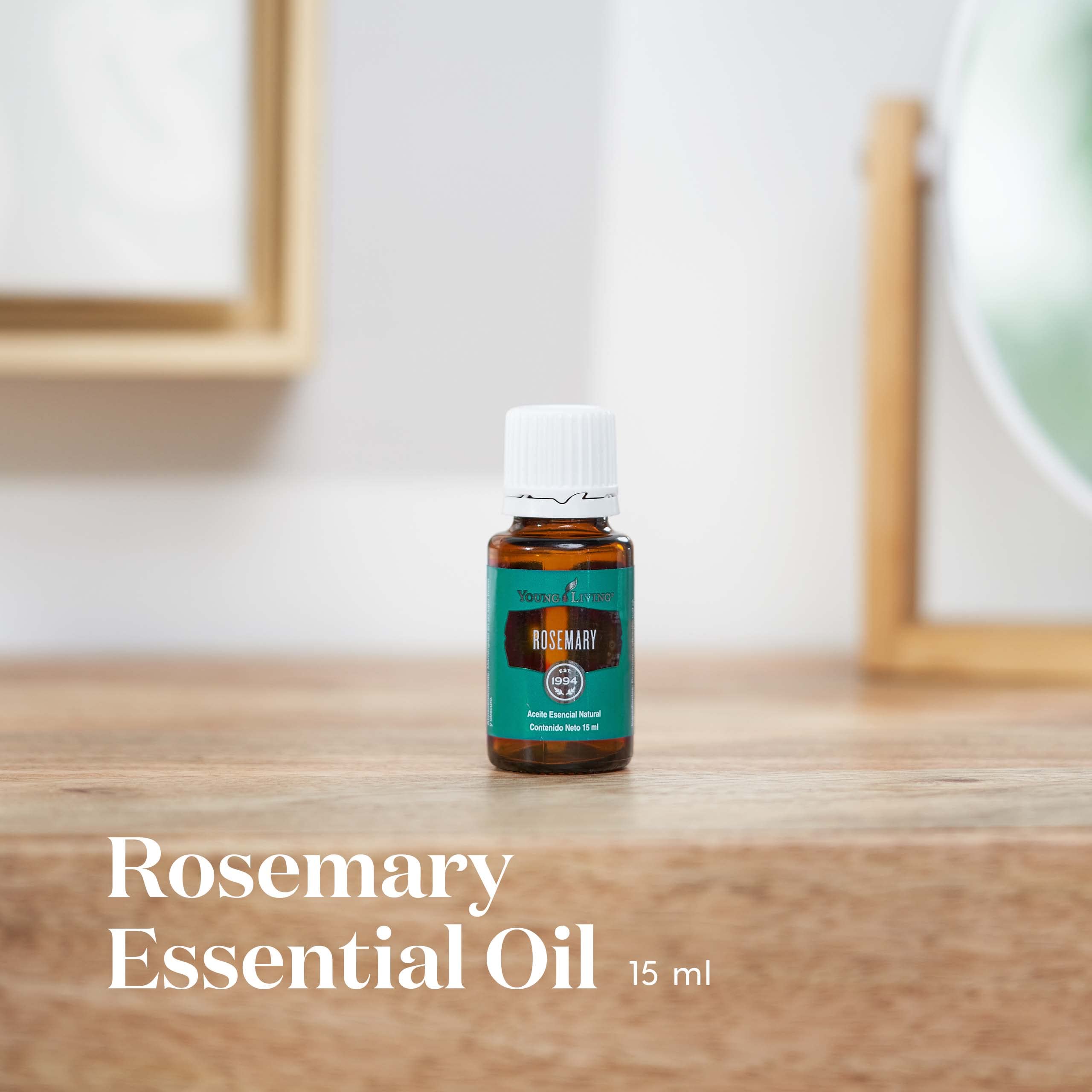 Young Living Rosemary Oil in diffuser releasing energizing scent.