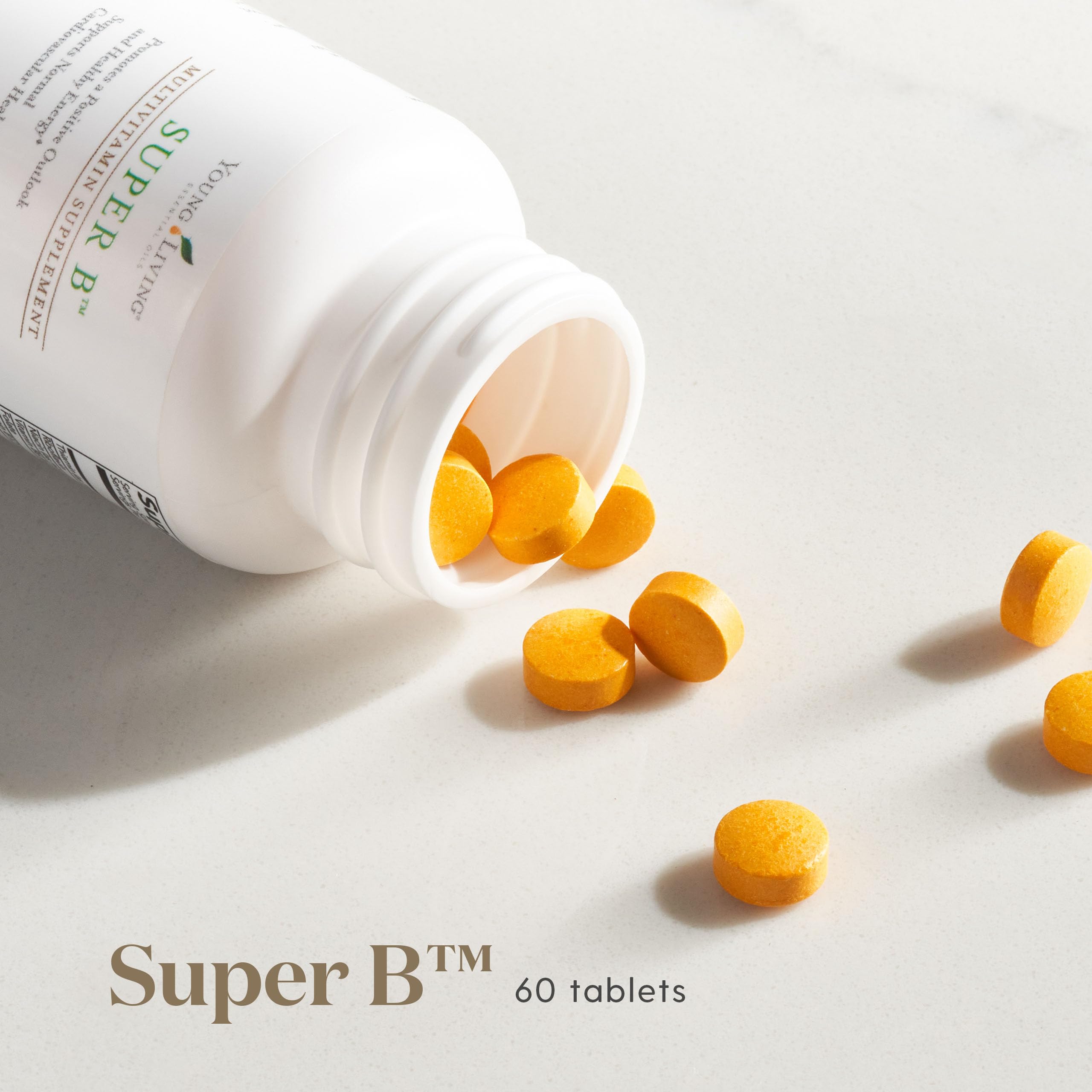 Young Living Super B capsules closeup highlighting essential vitamins for daily energy.