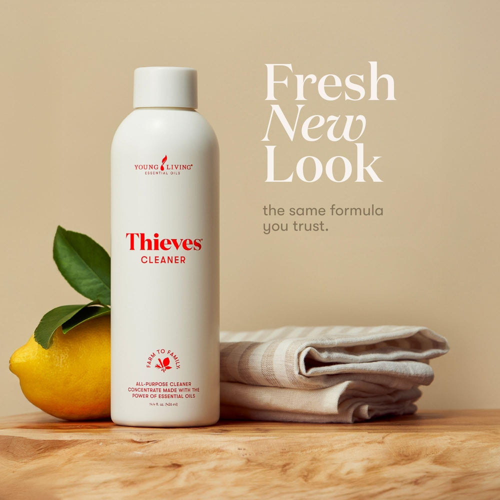 YOUNG LIVING Thieves Cleaner kitchen counter being cleaned with fresh scent