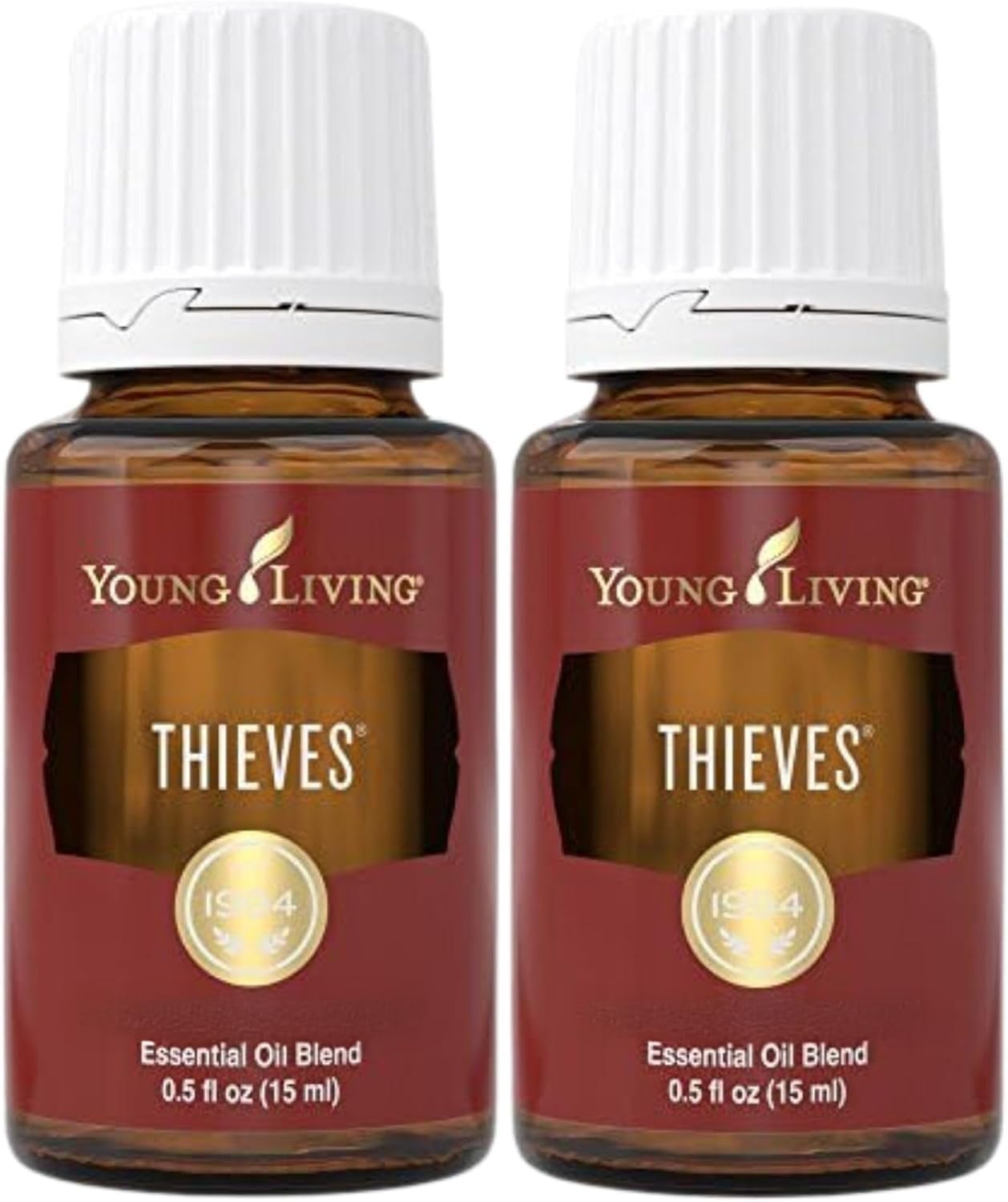 Young Living Thieves 15ml rosemary bottle releasing a warm aroma for diffusing sessions