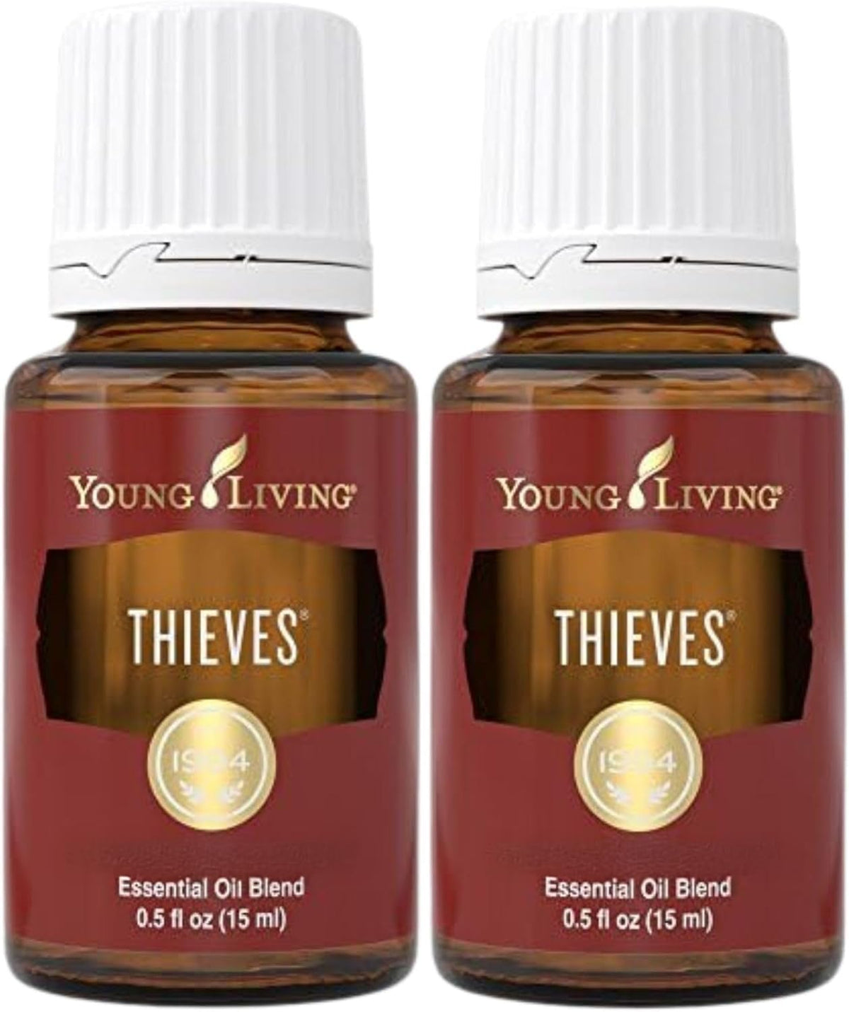 Young Living Thieves 15ml rosemary bottle releasing a warm aroma for diffusing sessions