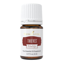 Young Living Thieves Vitality bottle closeup for a pure aroma ready to diffuse or blend