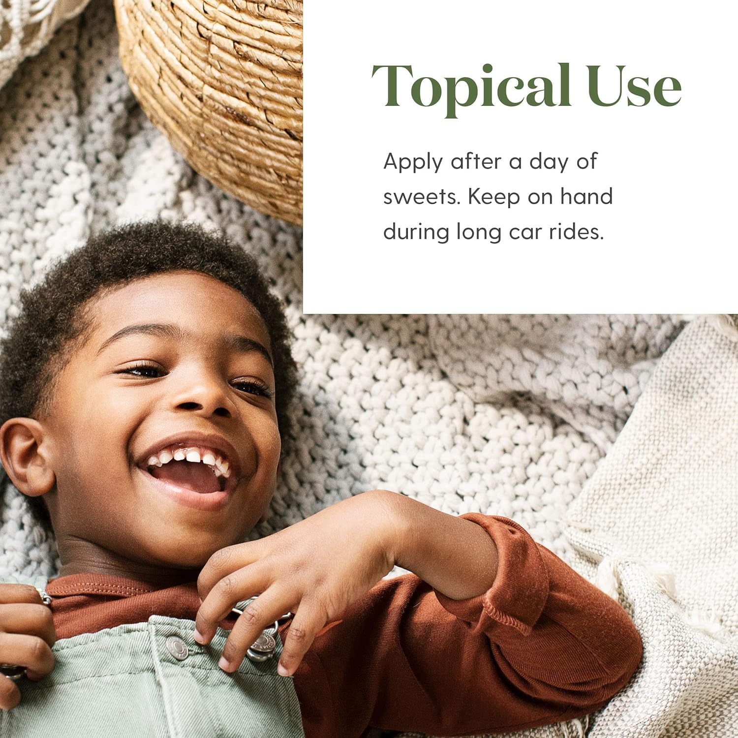 Young Living TummyGize in hand showing soothing aroma for little ones