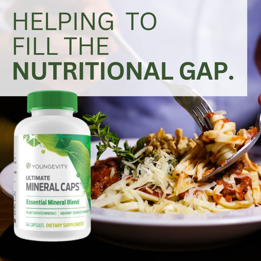 Youngevity Ultimate Mineral Caps shown in a daily routine setup with water.