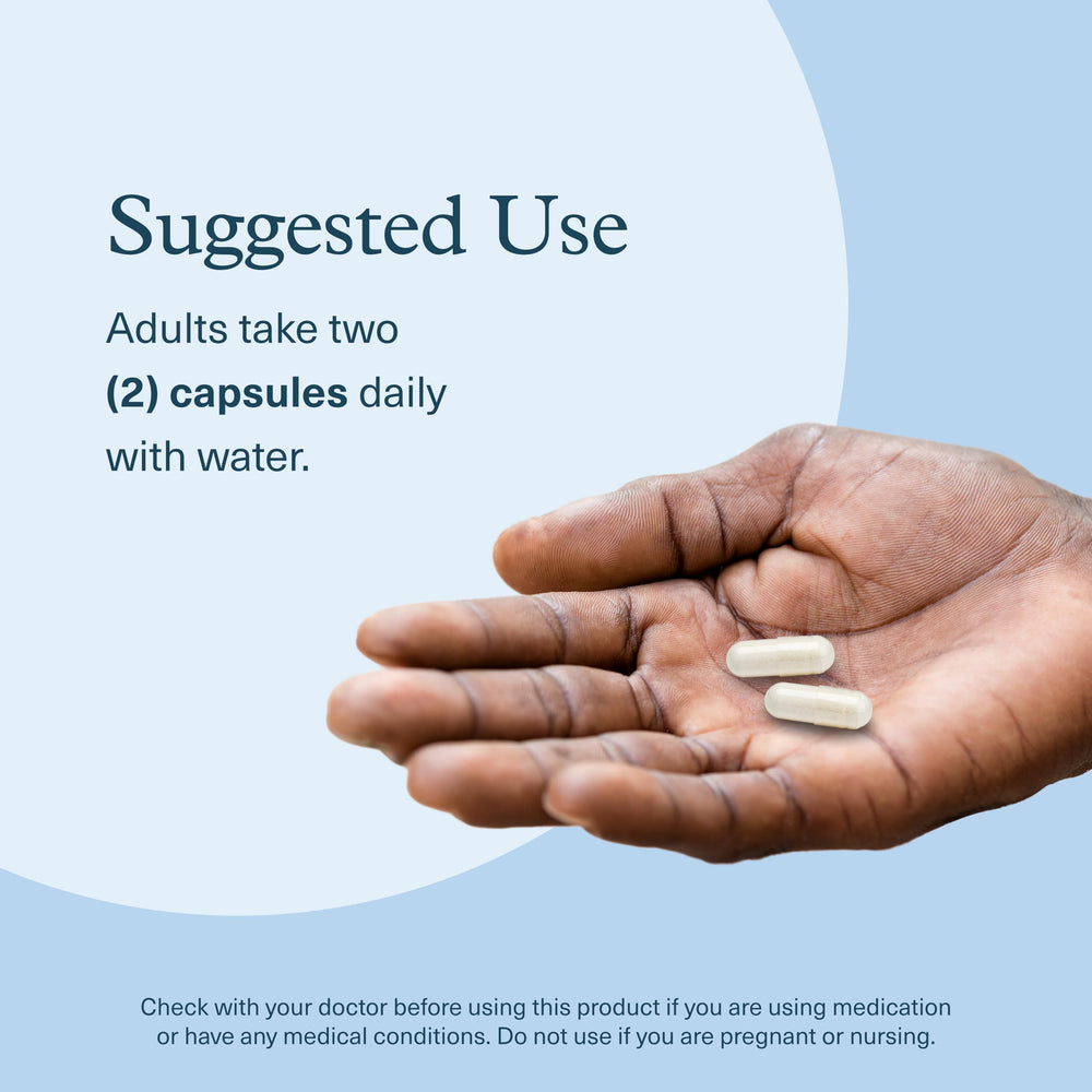 Pouring Youtheory Ashwagandha capsules to illustrate easy daily intake