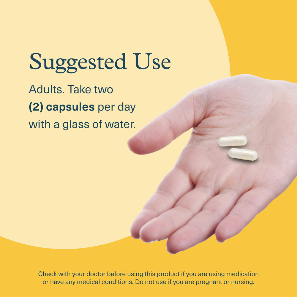 Pouring Youtheory Shilajit Advanced capsules into a glass, convenient daily use