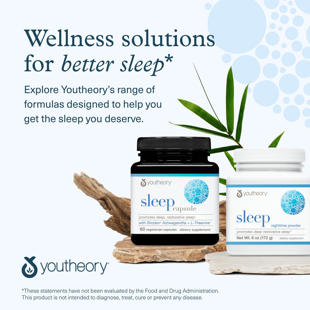 Youtheory Sleep Nighttime Powder on a nightstand beside a glass.