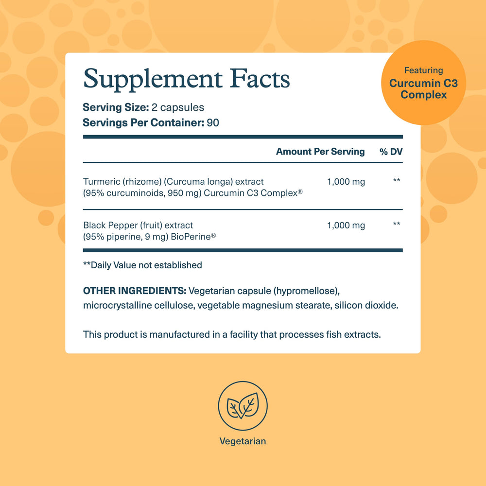 Youtheory Turmeric Extra Strength 1000 mg capsules close-up showing vegetarian capsules for easy daily use.