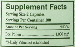 YS ECO Bee Farms Bee Pollen capsules closeup showing pure multi-floral pollen