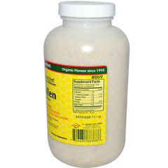 YS Eco Bee Farms Bee Pollen granular texture on spoon, great for cereals or baking.