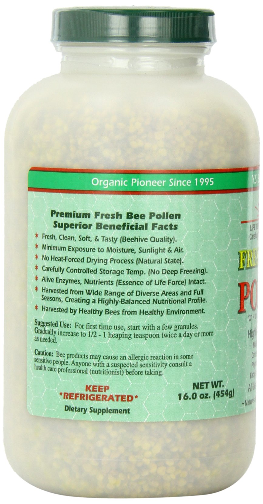 YS Organic Bee Farms spoon of bee pollen granules ready to mix into smoothies