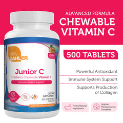 Close-up of Zahler Junior C chewable tablet with vibrant orange color and texture.