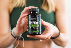 Zeal Naturals ACV capsules bottle on kitchen counter