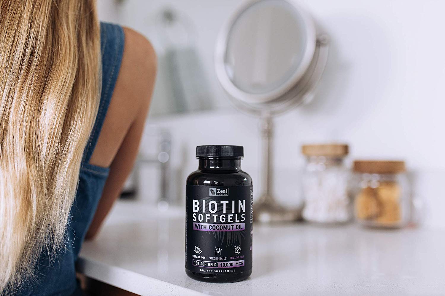 Six-month supply packaging emphasizes long-term biotin routine with coconut oil.