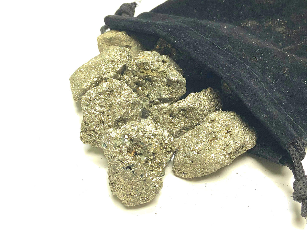 Zentron pyrite rough stones in a velvet bag for easy storage.