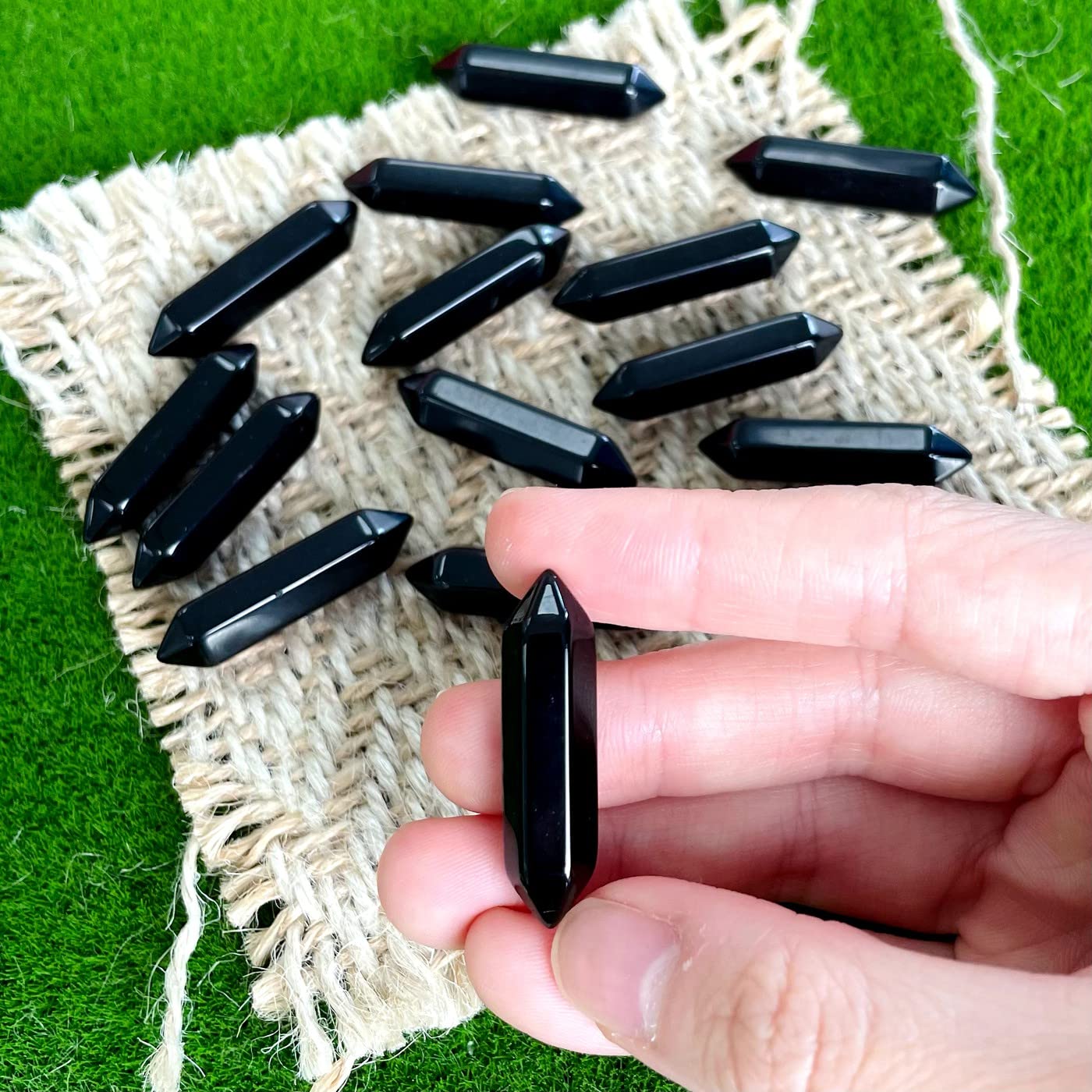 ZHIYUXI obsidian crystal wand closeup for calming rituals.